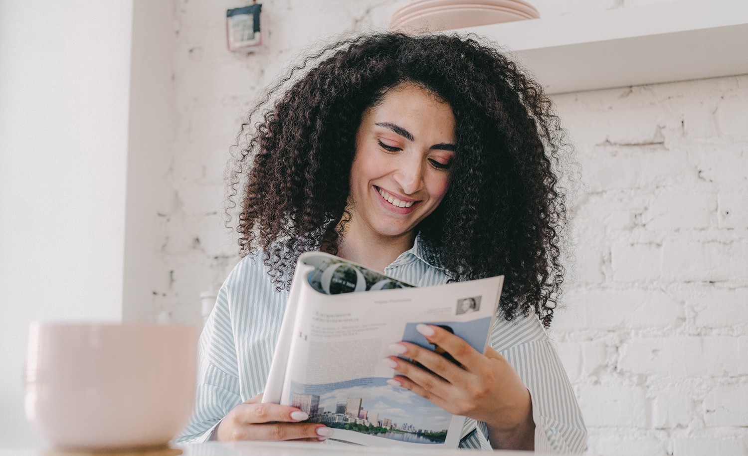 An introvert reads a magazine