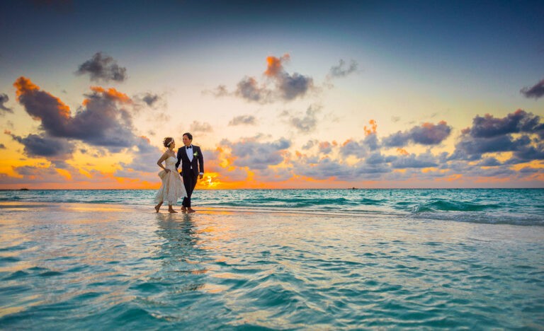 An introverted couple elopes to a deserted beach