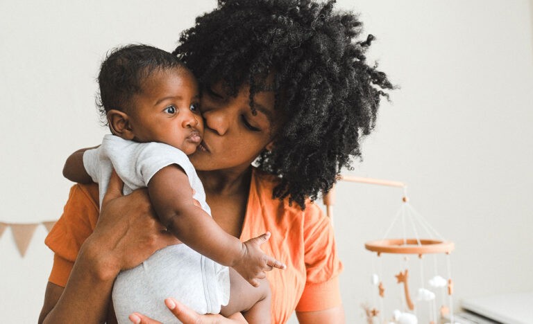 An introvert with her newborn
