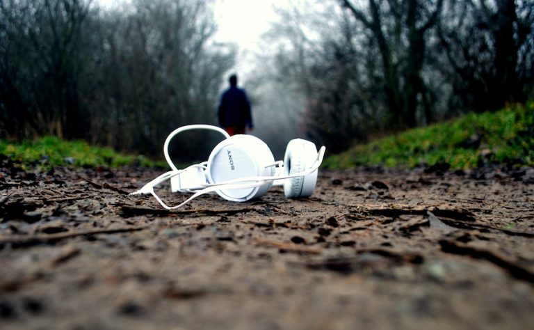 IntrovertDear.com highly sensitive introvert headphones at work