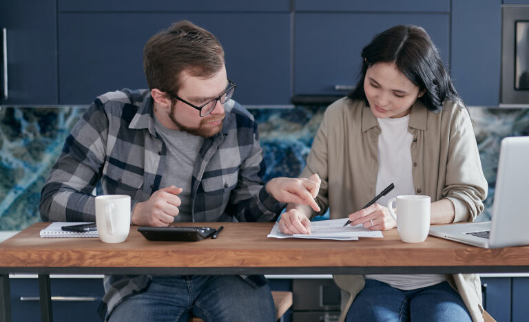 An introvert-extrovert couple work in the same room