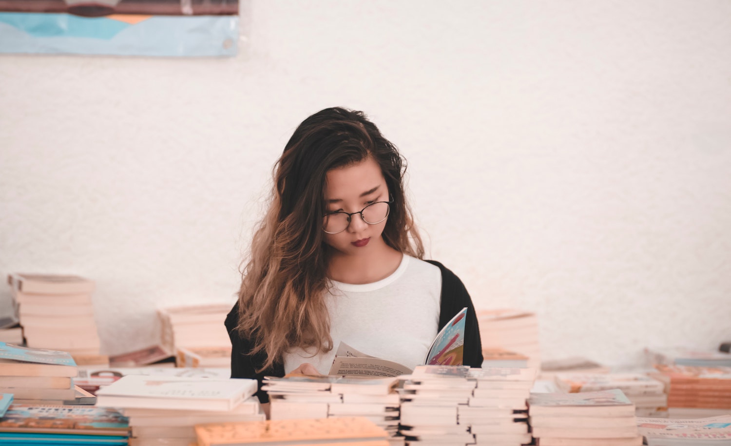 an introvert chooses a book to read in the new year