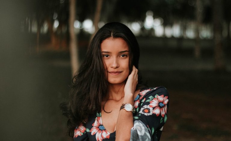 An introvert smiles at the camera.