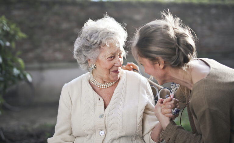 An introvert volunteers and helps an elderly woman