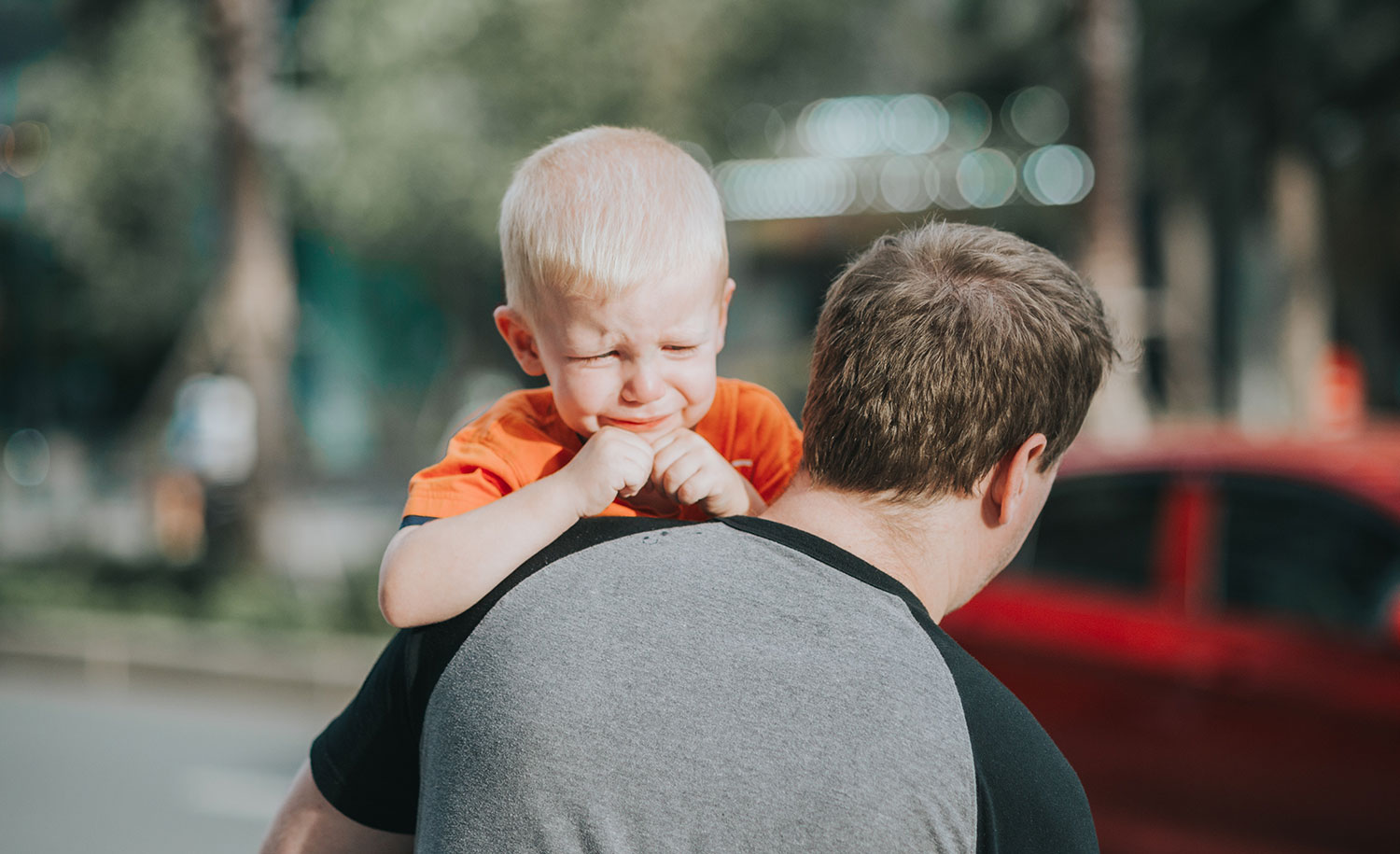 A highly sensitive, introverted parent carries his crying son