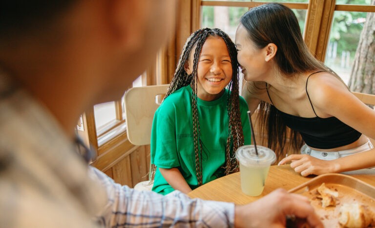 An introverted stepparent plays with her stepdaughter