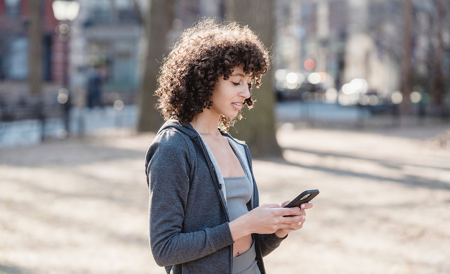 An introvert reads a text message.
